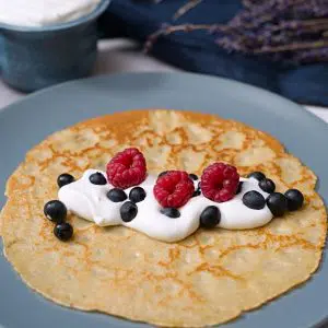 pancake on plate with berries.