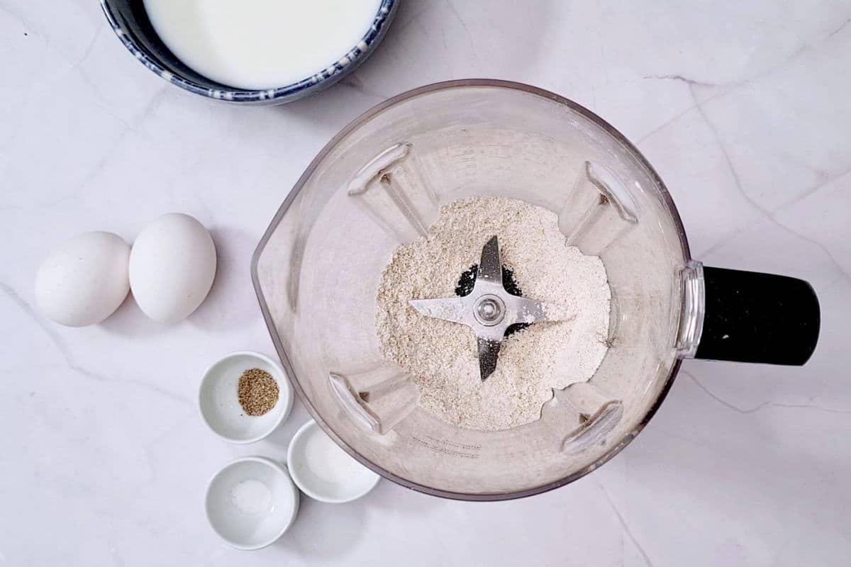 Blended oats into flour in blender can.