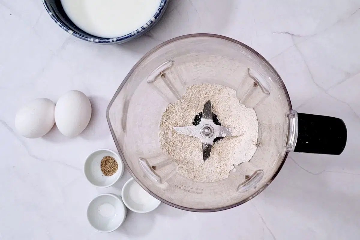 Blended oats into flour in blender can.