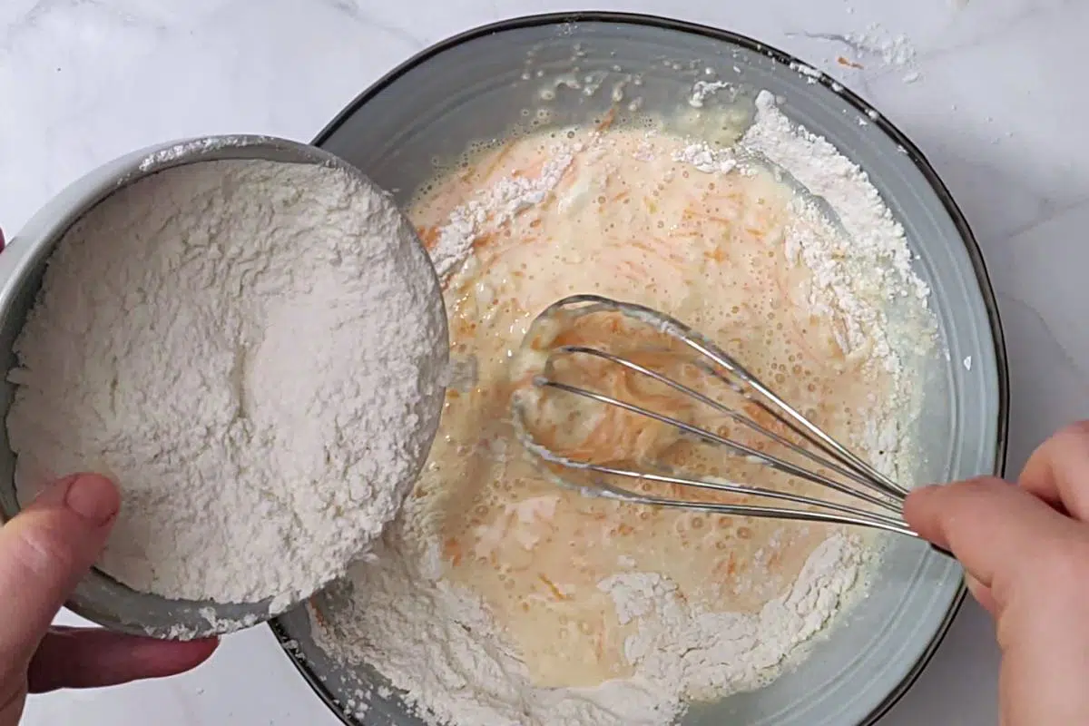 Batter being mixed in bowl. 