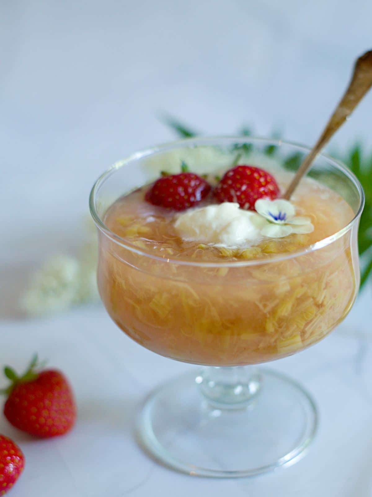 closeup on a glass with rhubarb soup. 