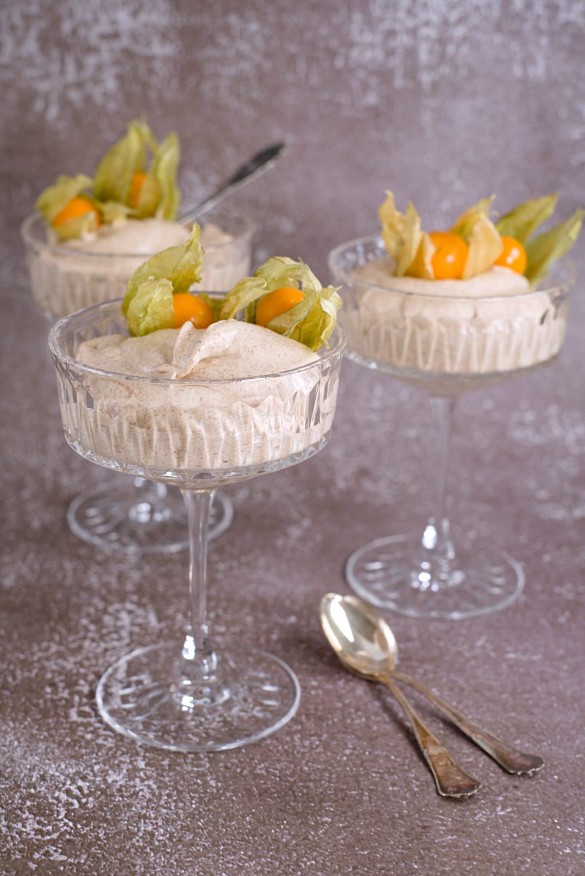 mämmi dessert in three glasses with spoons.