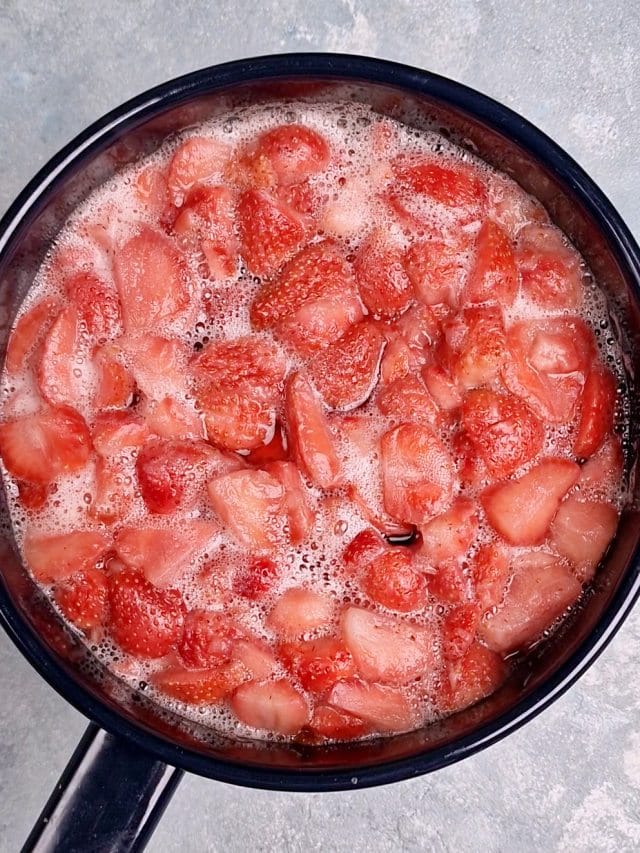 strawberries foaming in pan. 