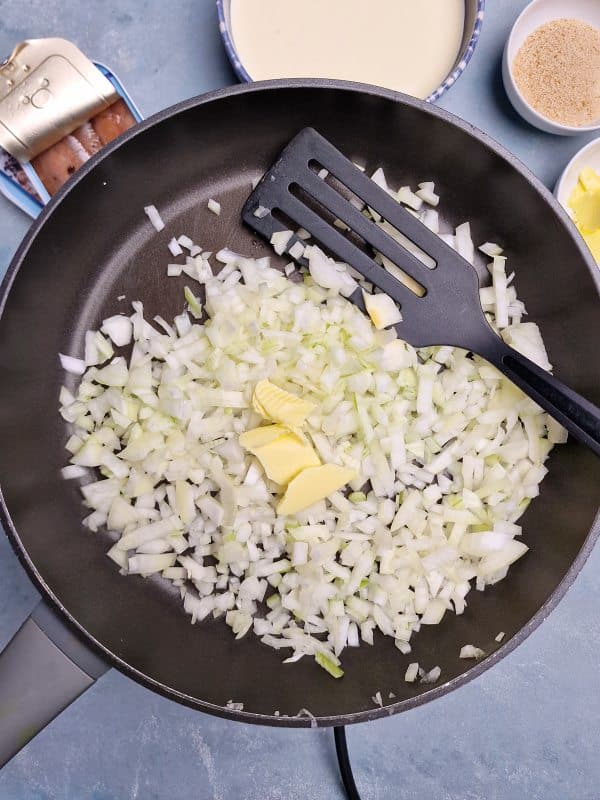 chopped onion and butter on pan. 