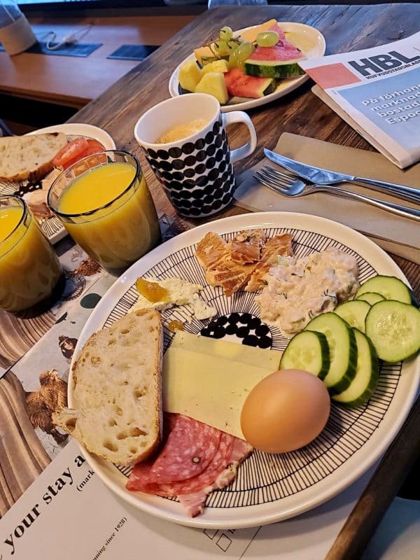 a hotel breakfast selection on plate. 