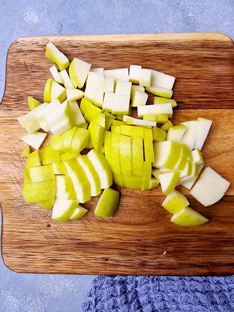 Chopped apple in small cubes. 