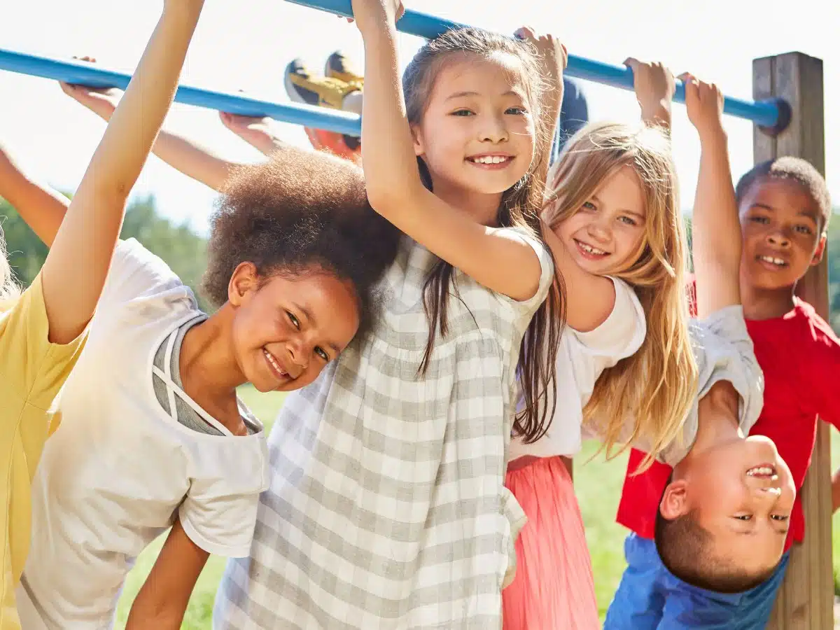 Multicultural kids on playground. 