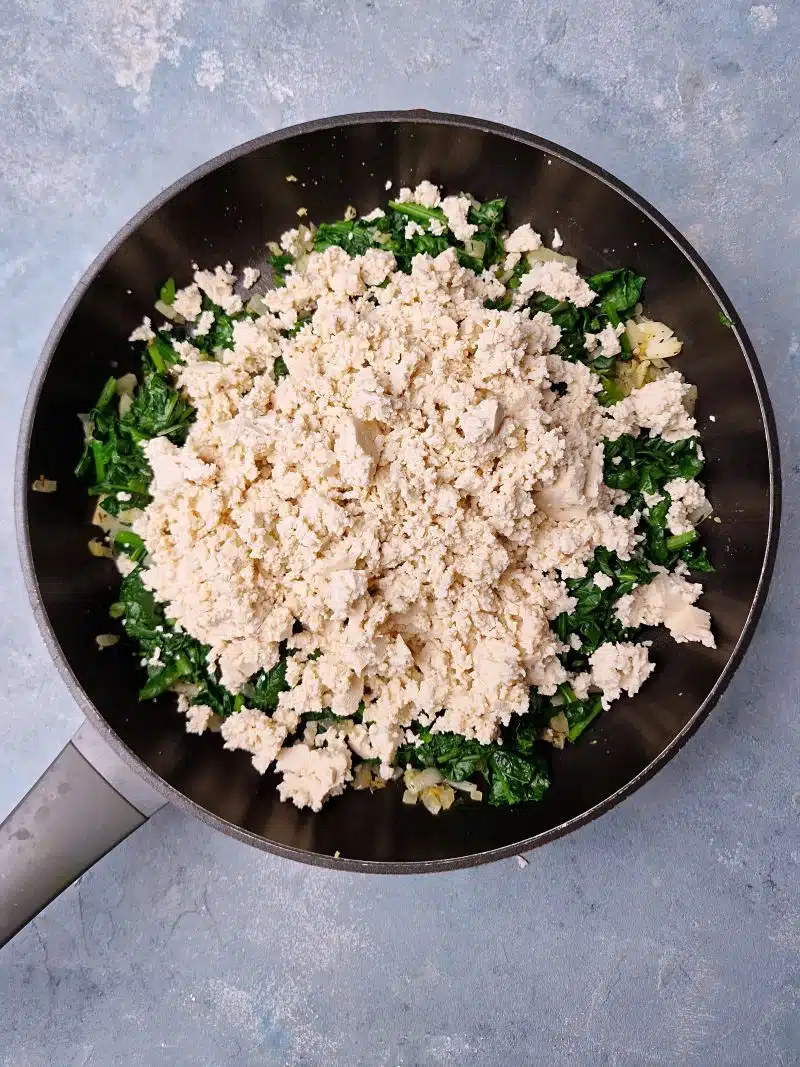 mix of onions, spinach, tpfu and feta cheese. 