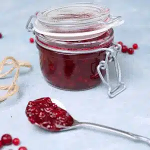 Red jam in a jar.