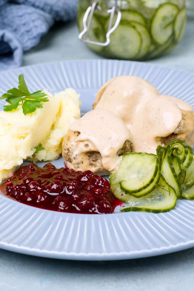 Swedish cucumbers served with meatballs and gravy, lingonberry jam and mash. 