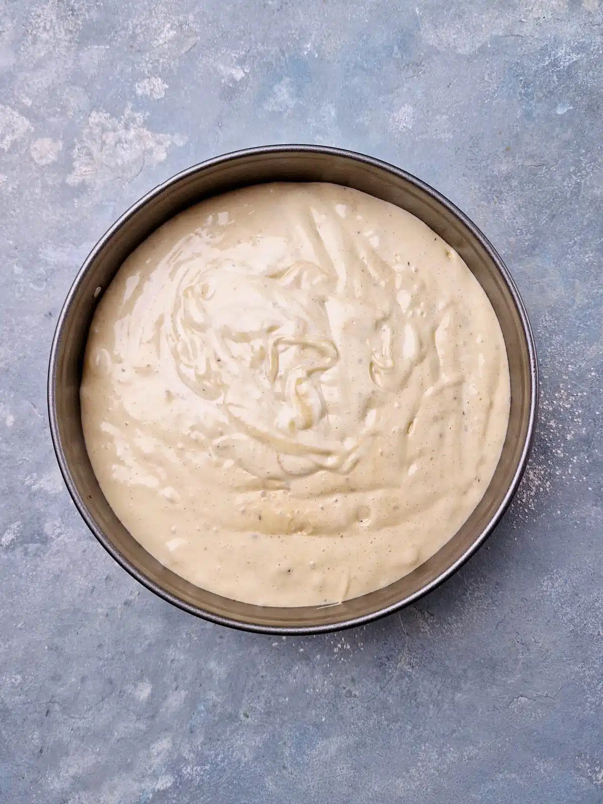 Fluffy light batter in springform pan. 