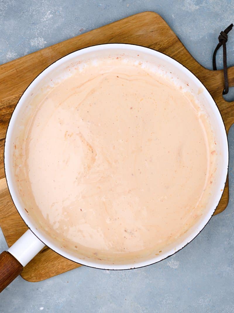 Creamy sauce in pan. 
