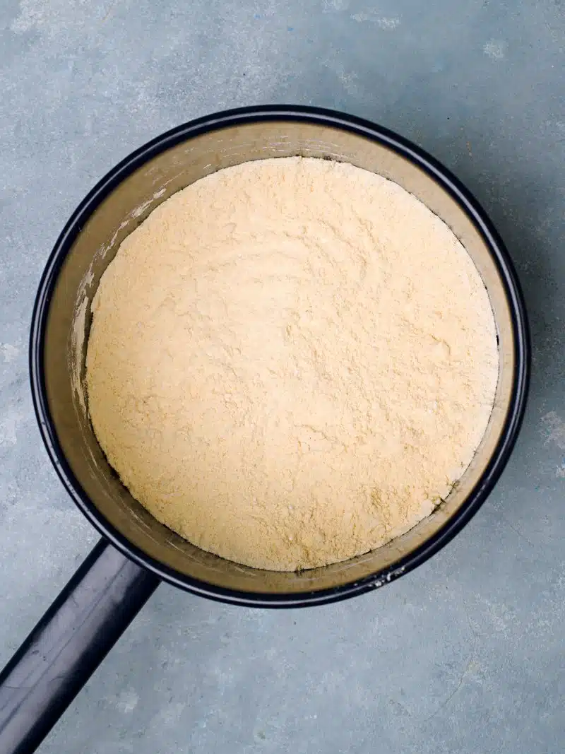Yellow powder in blue pot. 